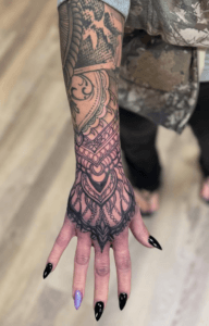Mandala tattoo placed on forearm in Tribal Rites Loveland